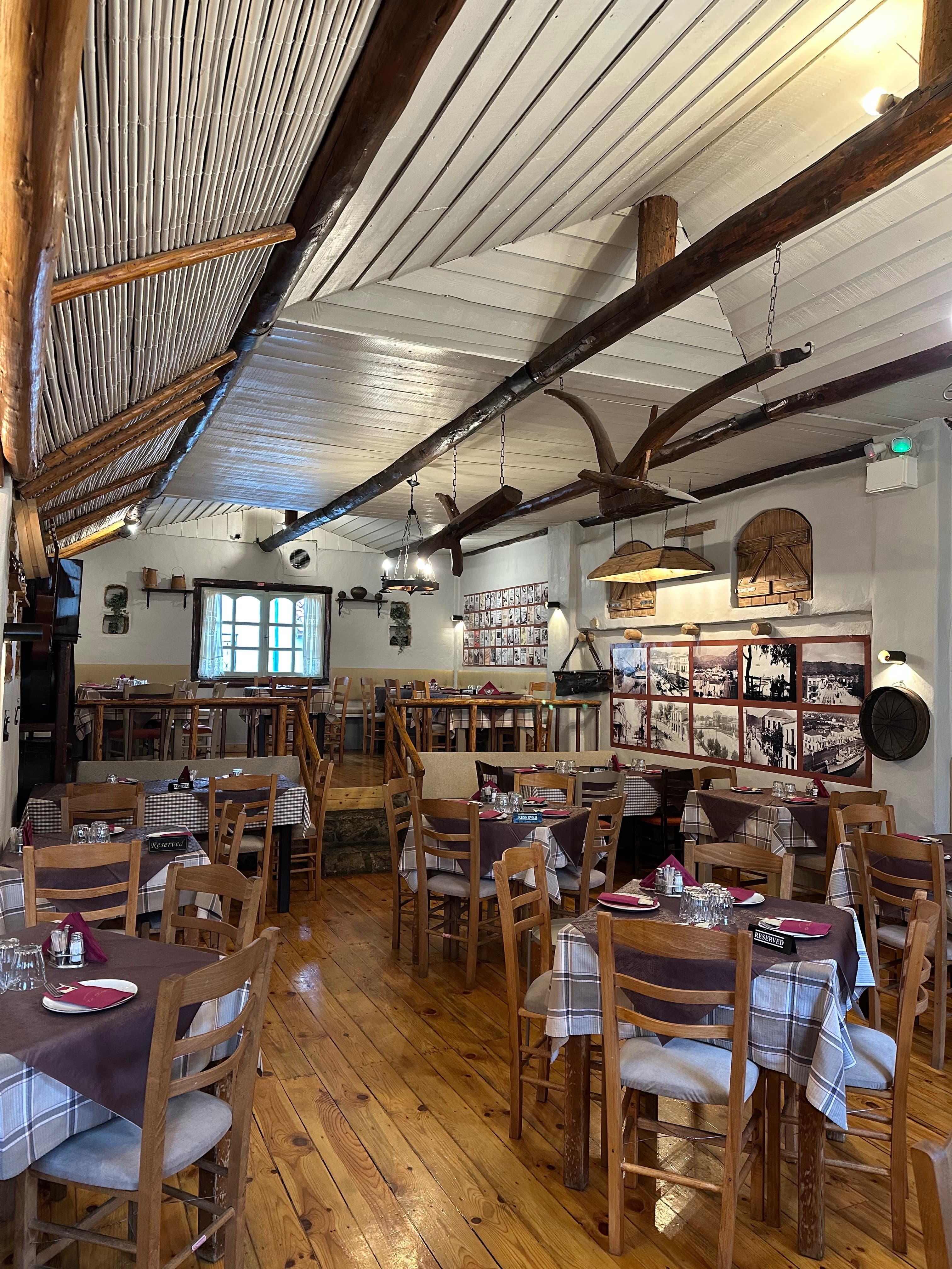 Indoor dining room with wooden beams